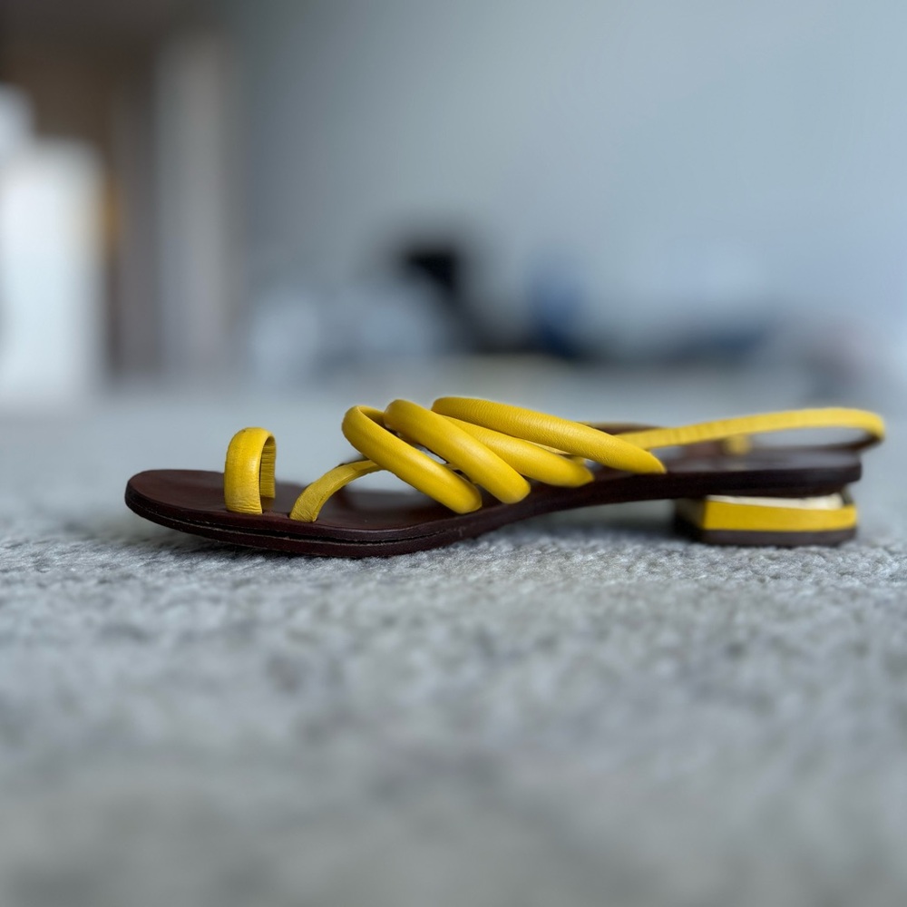 Tory Birch yellow sandals…. strappy and beautifully designed. comfortable.